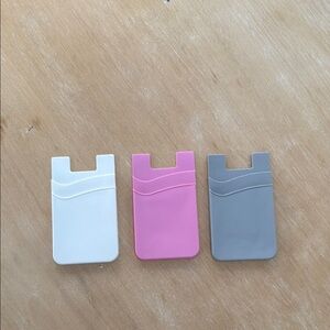 Universal Silicone Card Holder for Smartphones - White, Pink, and Gray